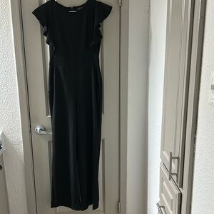 Beautiful Romper Color Black Size Small Very Stretchy.